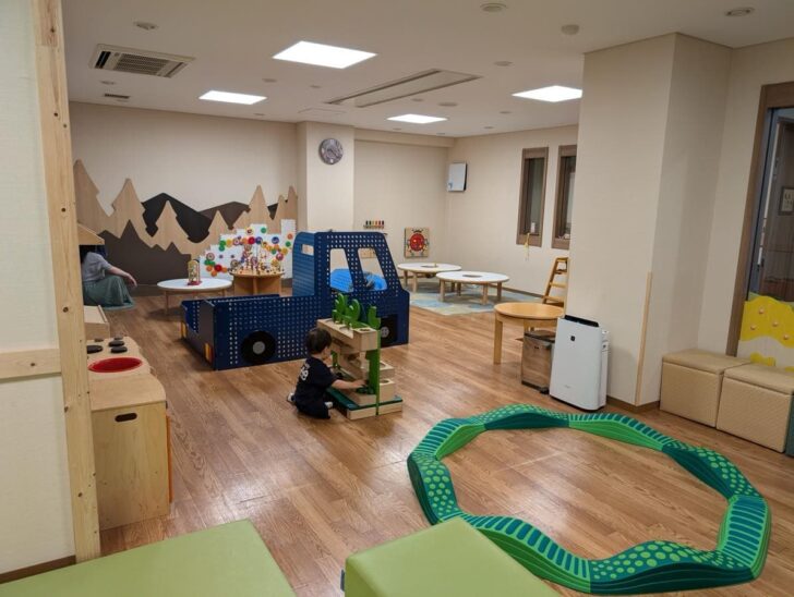 Our child playing in the kids' room