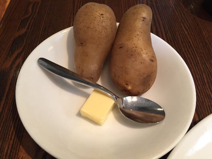 The potatoes, served right away, can be enjoyed on their own or paired with the curry