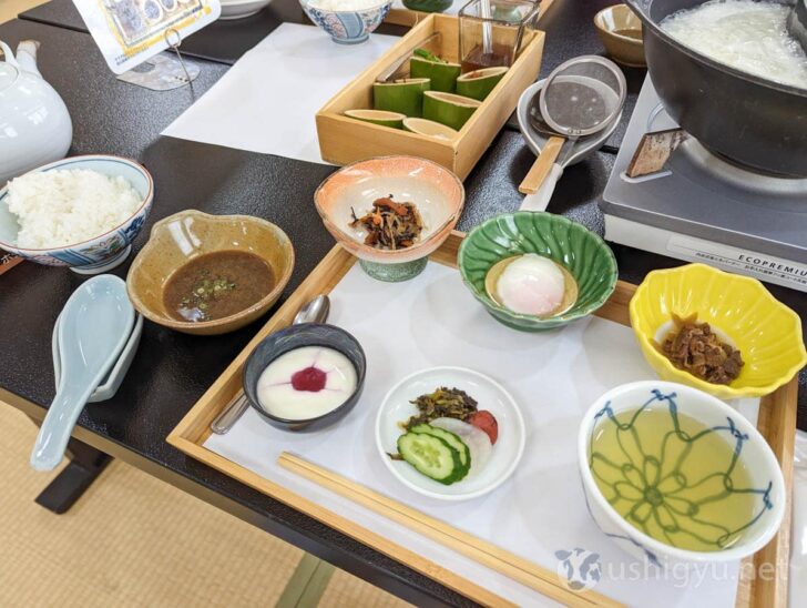 Dipping hot spring tofu in sesame sauce