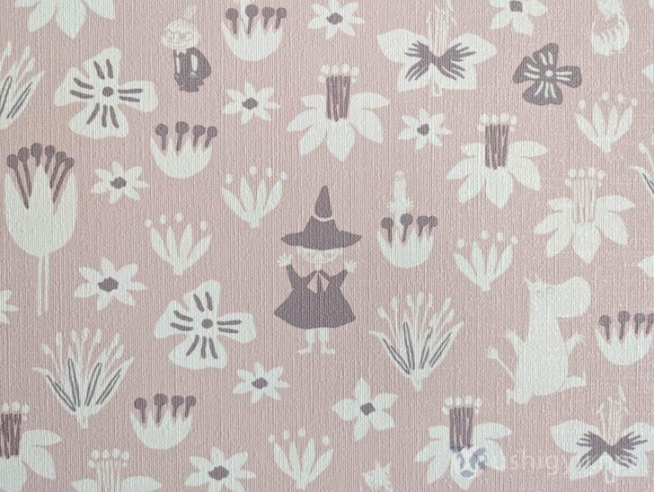 Living room wallpaper features Moomin, Snufkin, and Little My