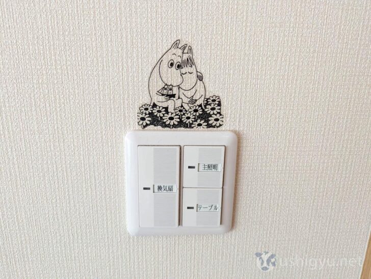 Moomin and Snorkmaiden above the light switch