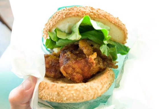 Large pieces of fried chicken in the burger
