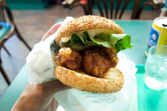 Taking a bite of the Chinese Chicken Burger