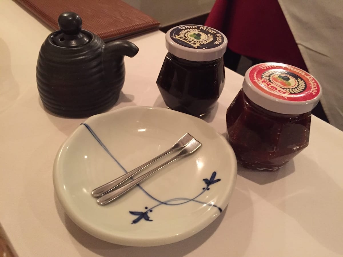 Additional condiments including spicy plum miso and plum pepper