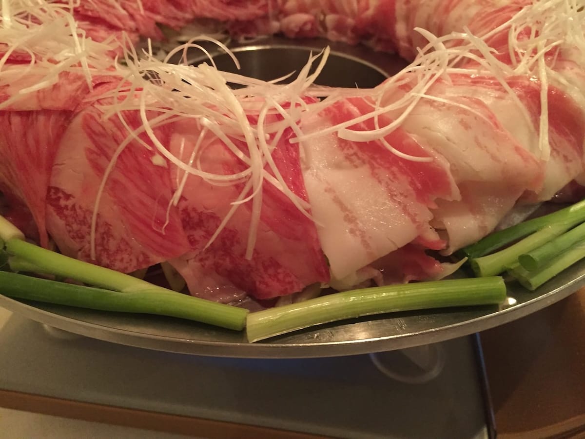 Vivid red meat arrangement with triangle cut and black pork selection
