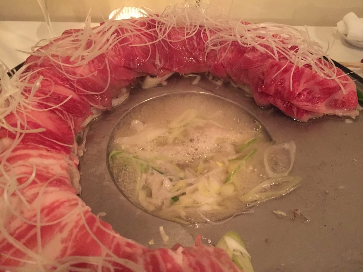 Meat cooked to the perfect degree in the tail soup