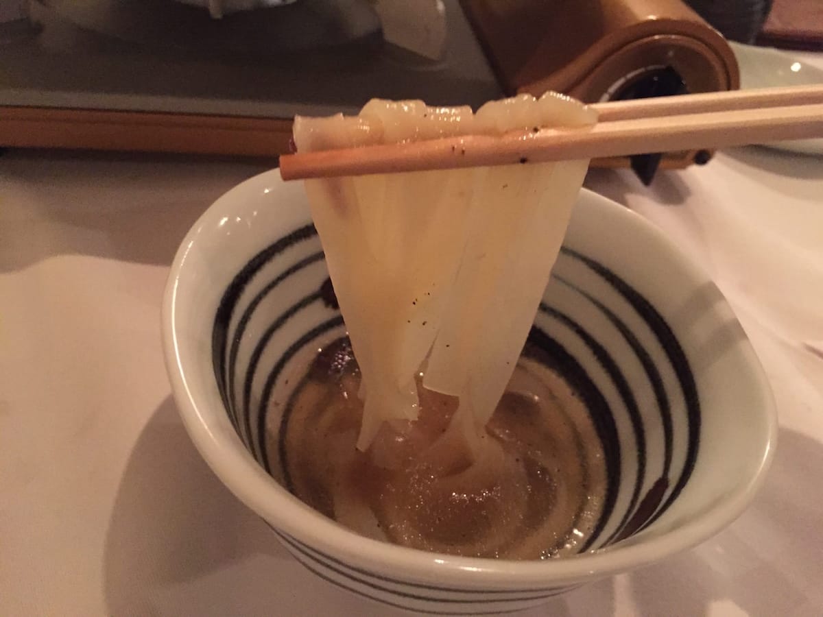 Noodles that have absorbed the concentrated broth and meat flavors