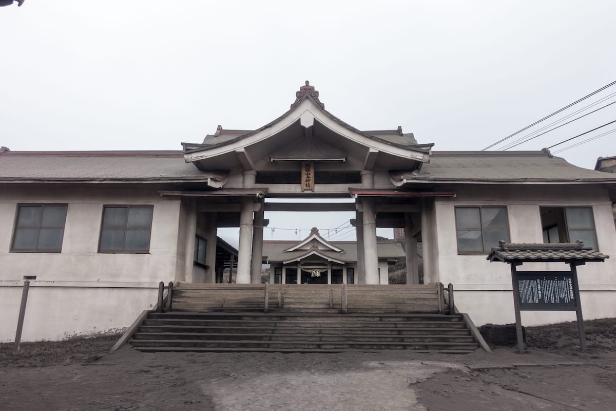 Shrine covered in volcanic ash