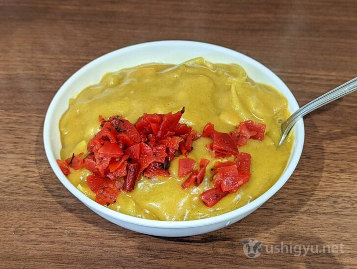 Curry made with pork, onions, and carrots in pork bone broth