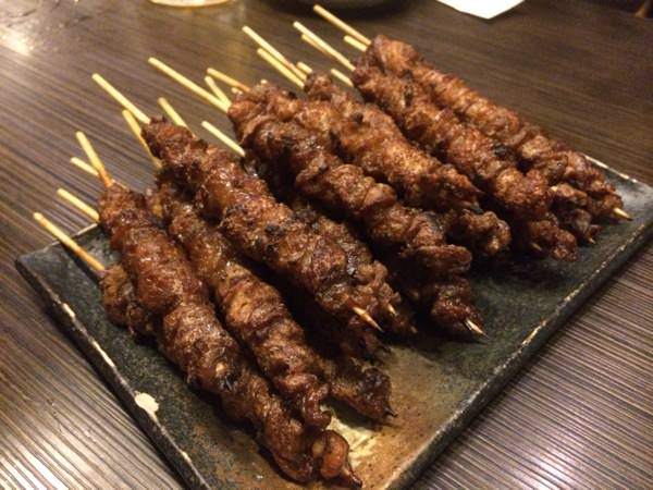 Crispy grilled chicken skin, the restaurant's signature dish