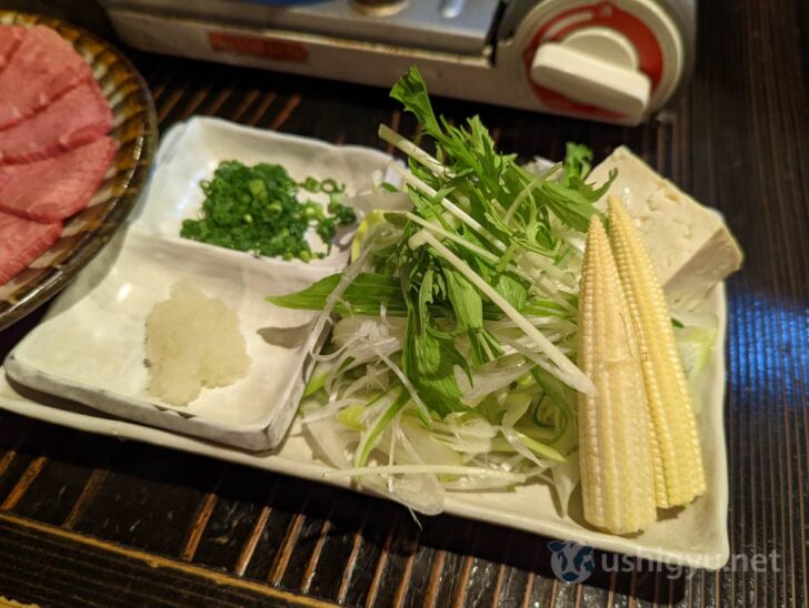 Green onions, mizuna greens, tofu, young corn to eat with the beef tongue, plus chopped green onions and grated daikon radish for the ponzu
