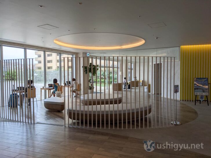 The surrounding area is well-equipped with sofa seating and table areas