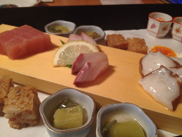 Appetizer and fresh sashimi served with Kyushu sweet soy sauce
