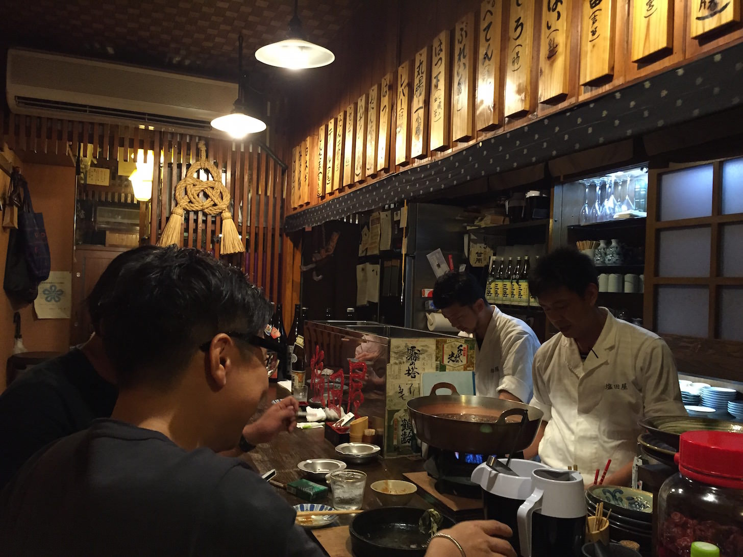 Small, cozy interior of Motsuyaki Shiotaya