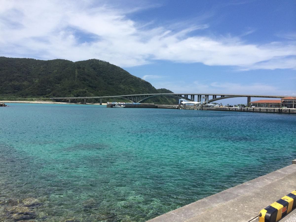 View of Akajima Bridge over turquoise waters