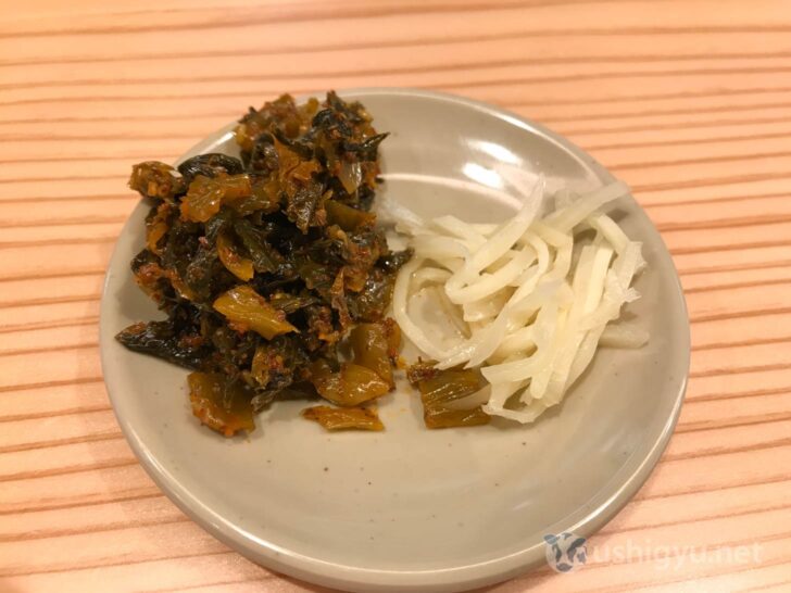 Enjoying spicy takana and ginger