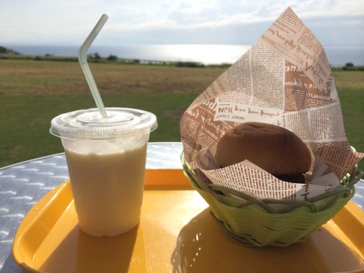 Burger and milk with ocean view