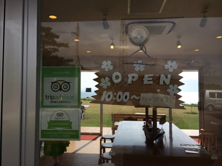 Operating hours sign until sunset