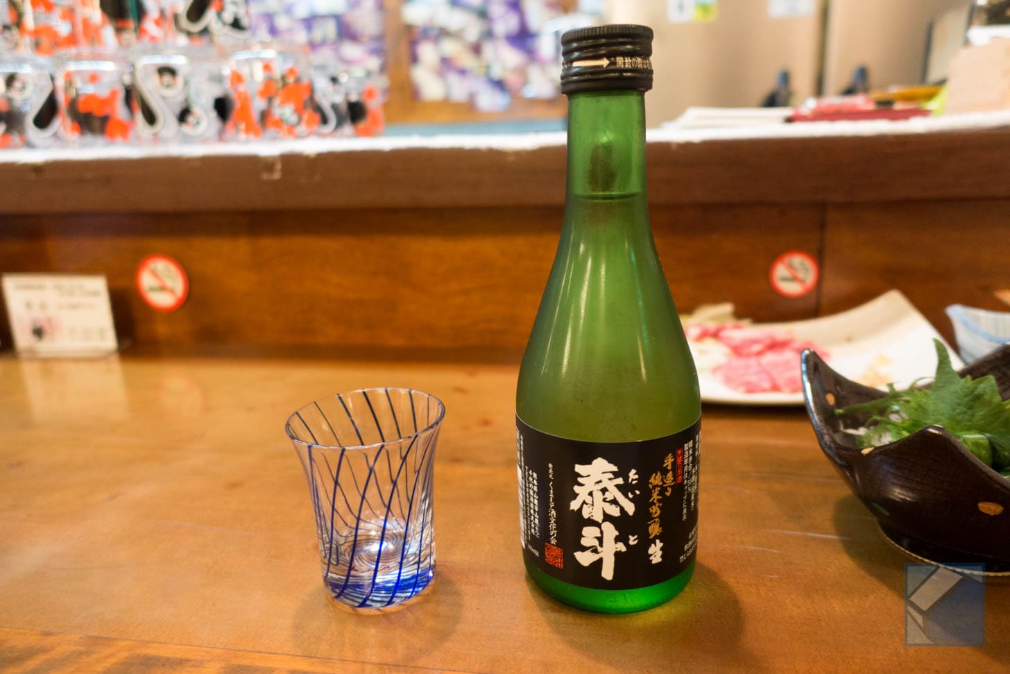 Bottle and glass of Taito junmai ginjo sake