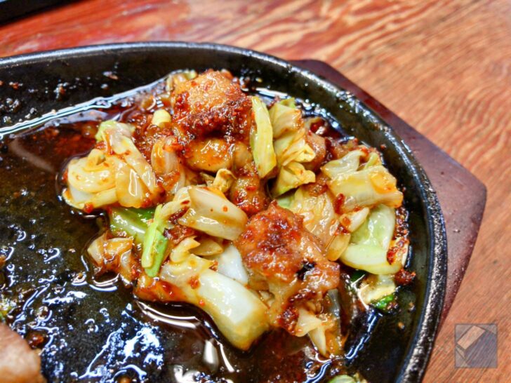 Eating meat coated in custom sauce