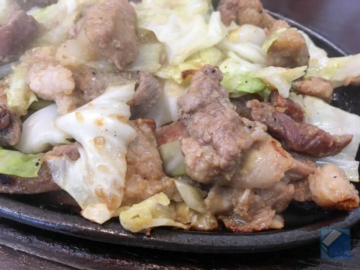 Eating grilled meat with rice