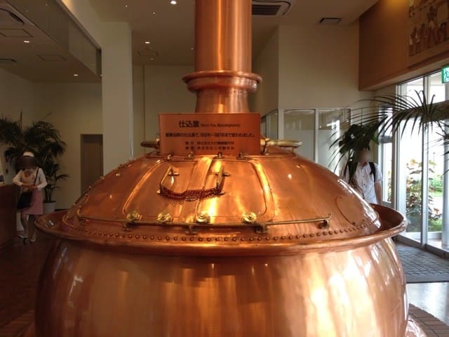 Large brewing kettles at entrance