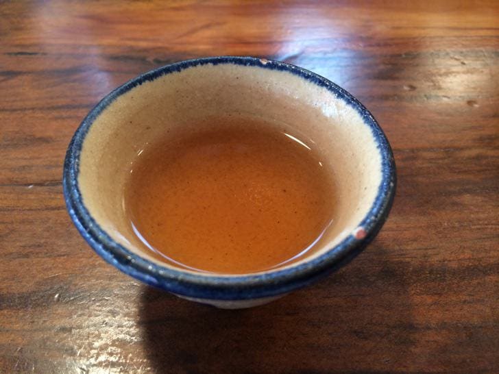 Homemade lemongrass tea served as finish