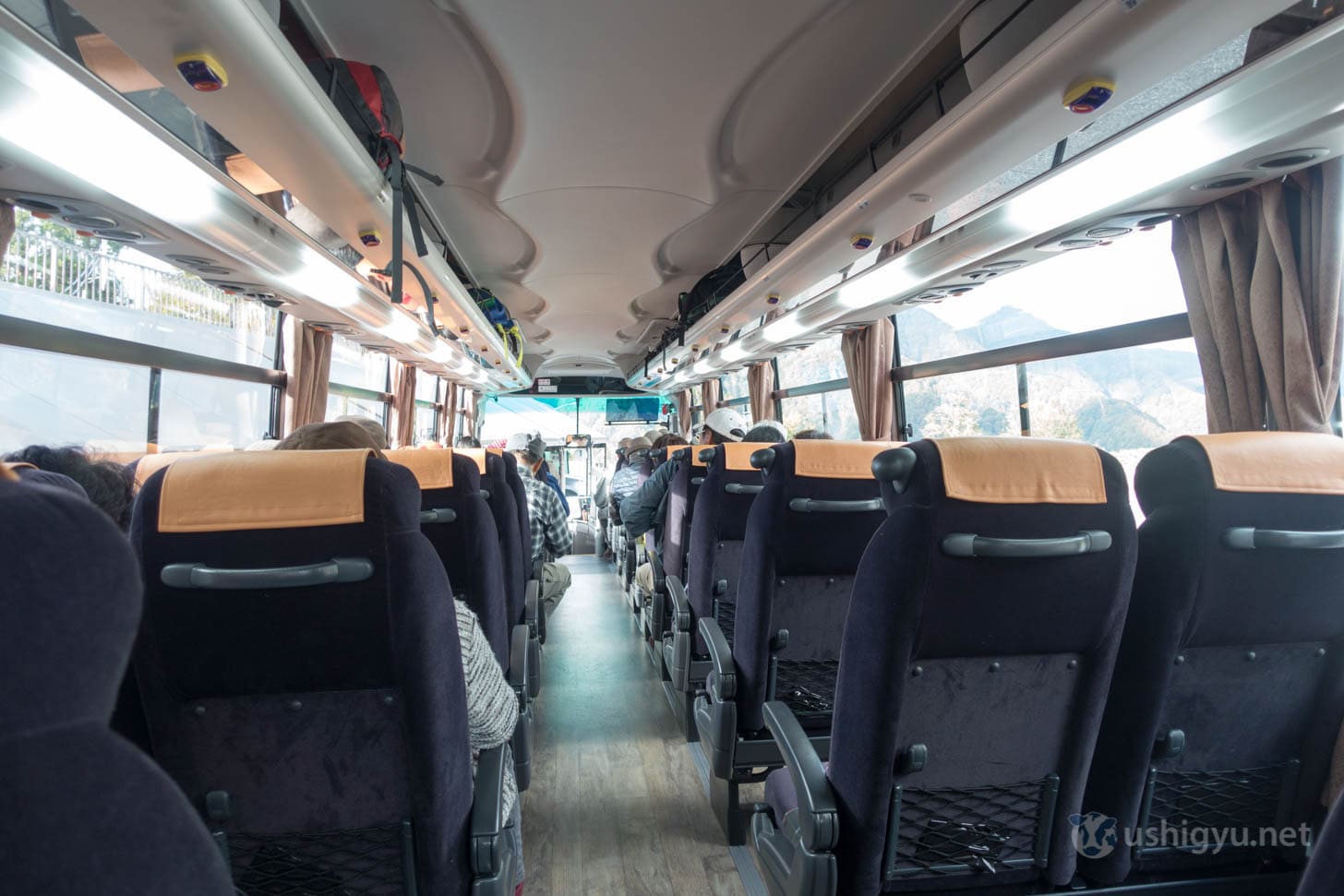 Bus traveling through alpine landscape