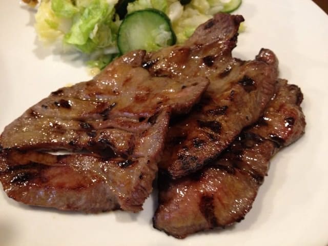 Close-up of perfectly grilled beef tongue