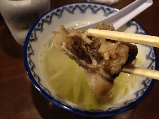 Tail soup with green onions and beef bones