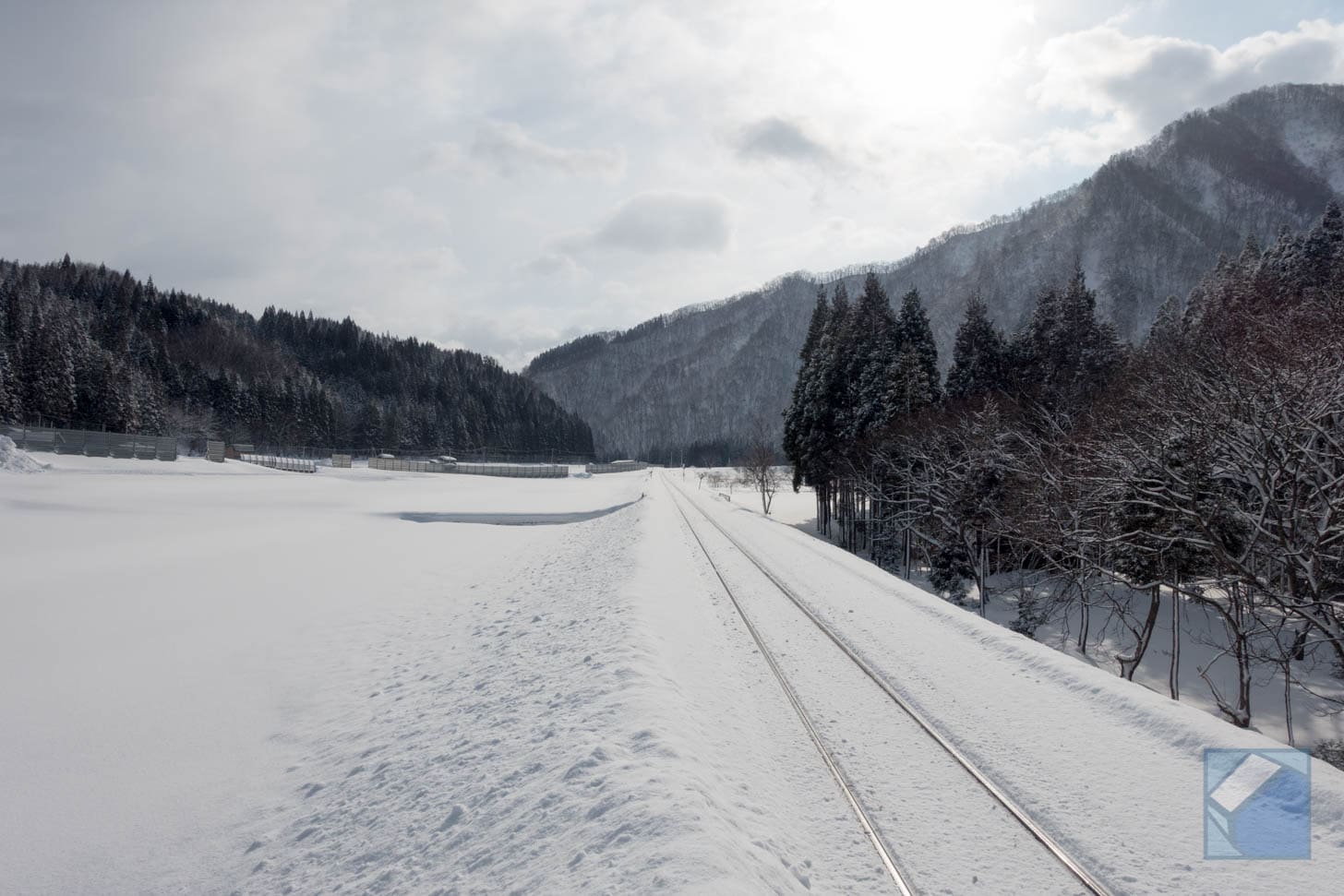 Railway tracks through snow
