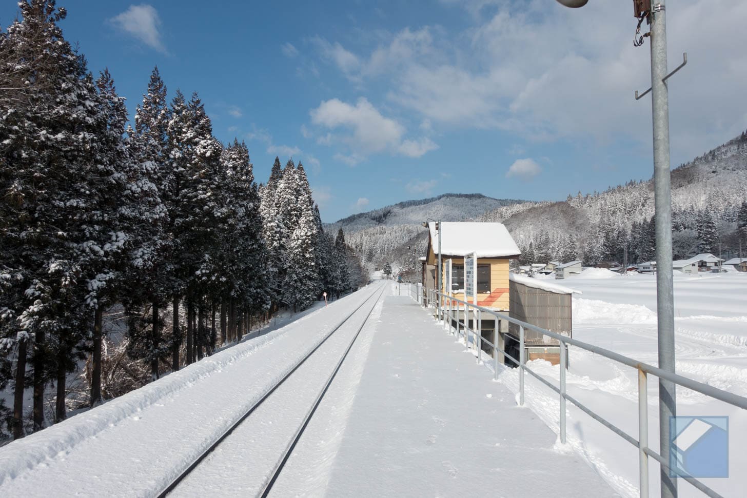 Snow-covered railway scene