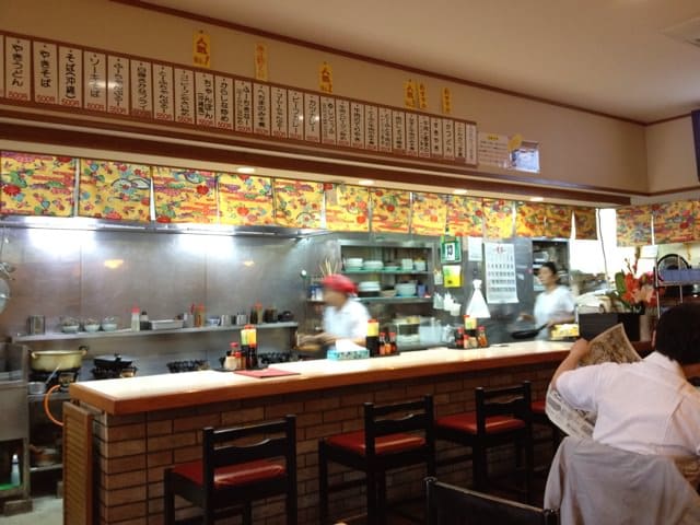 Kitchen staff preparing food at Mikado